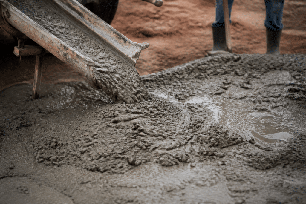 Béton avec zones sèches et humides inégalement mélangées